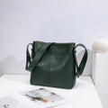 Wholesale Custom Full‑Grain Leather Bucket Bag Multi‑Front Pocket Design Adjustable Dual‑Strap Minimalist Everyday Shoulder Bag H98051