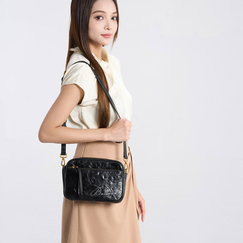 Wholesale Customizable Leather Crinkled Texture Camera Bag Multi‑Zipper Pocket Adjustable Strap Crossbody Bag H98038
