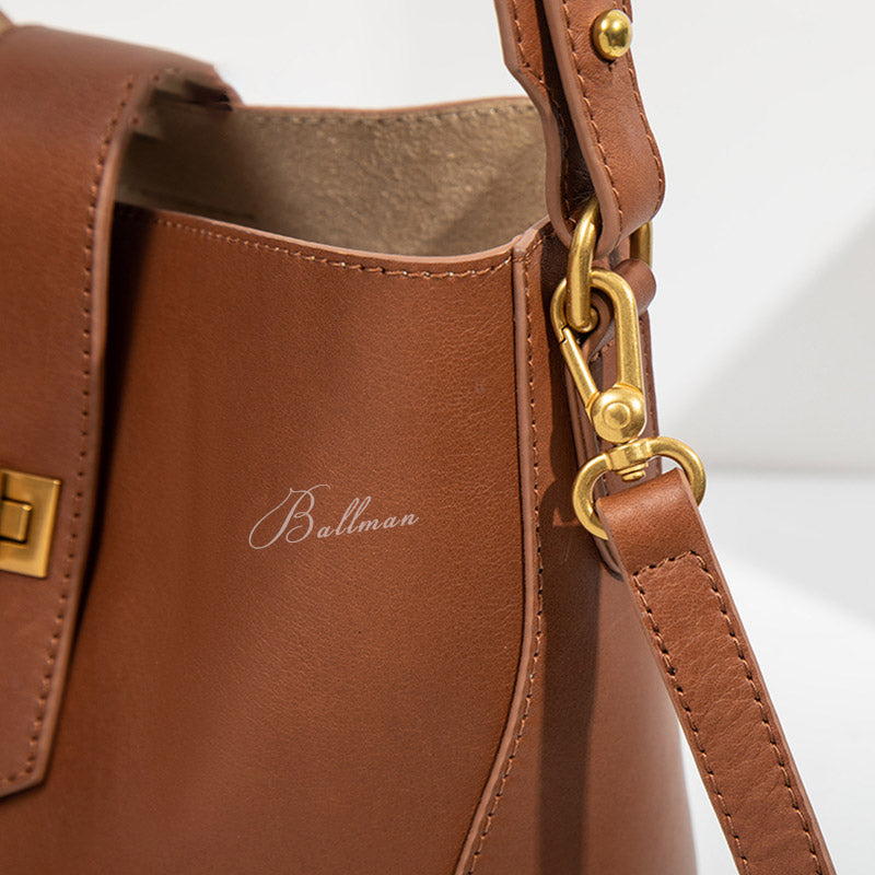 Wholesale Custom Italian Imported Full‑Grain Leather Bucket Bag Vintage Gold Turn‑Lock Closure Adjustable Shoulder Strap Elegant Daily Work Handbag H98052