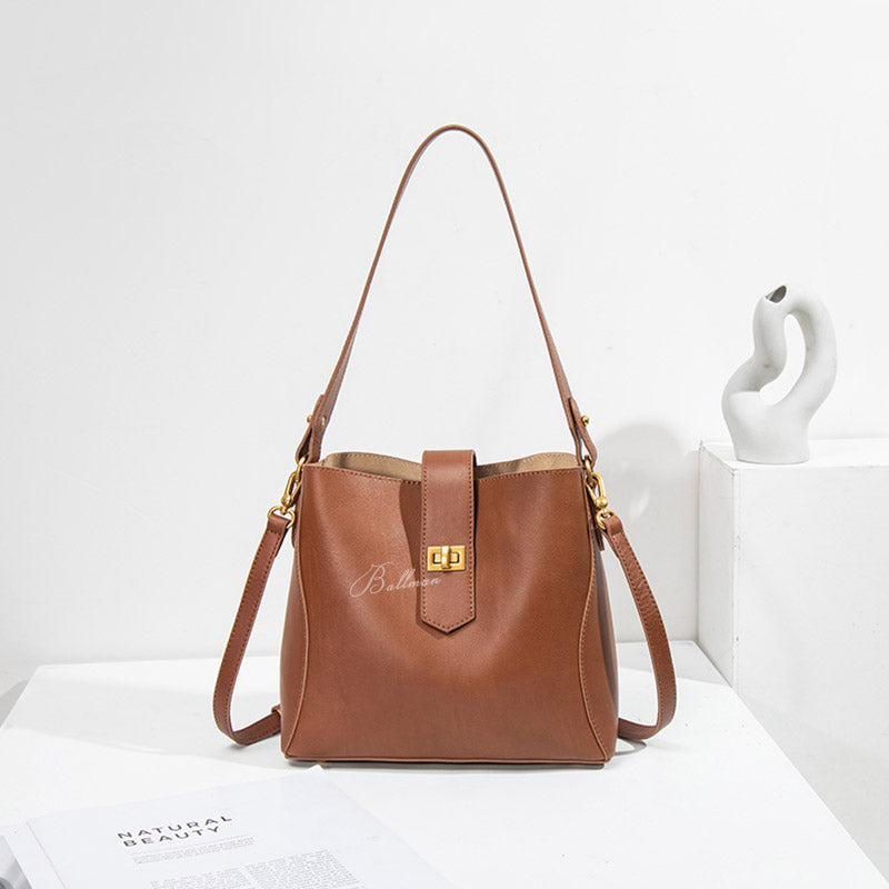 Ballman H98052 women bucket bag crafted from Italian imported full‑grain genuine leather, vintage gold turn‑lock closure, adjustable shoulder strap elegant daily work handbag